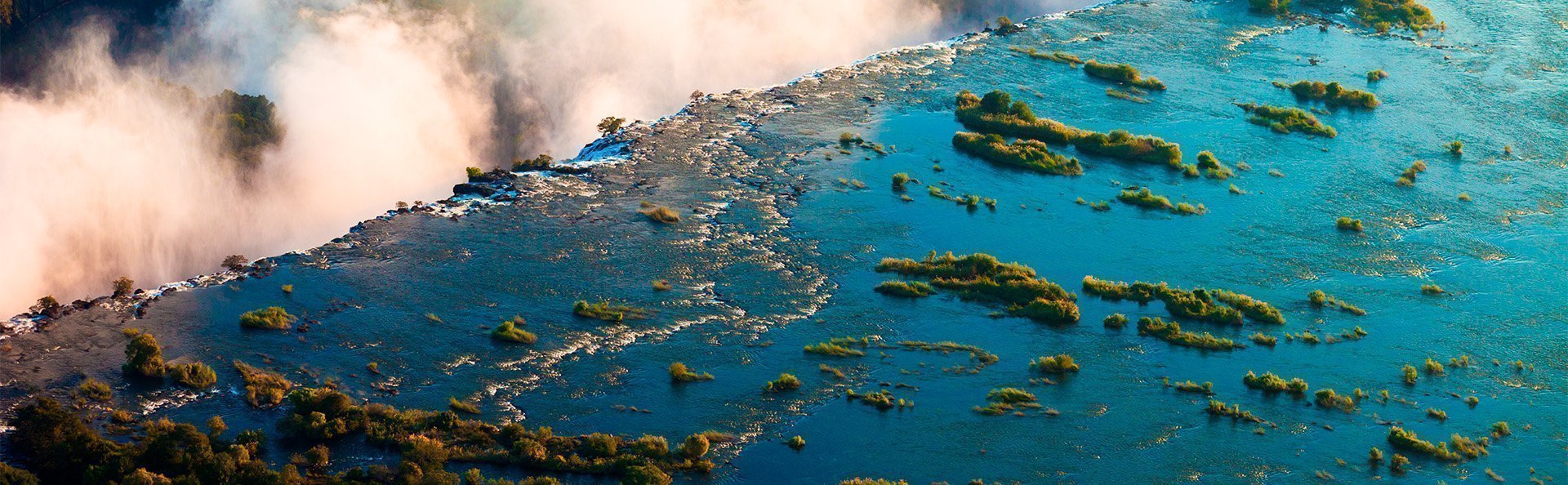 Oversigtsbillede fra Victoria Falls ved solnedgang